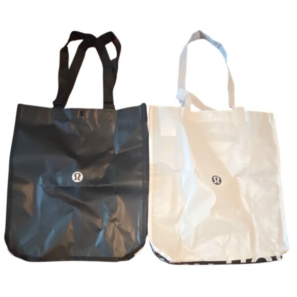 Lululemon Handbags - Lululemon large black and white shopping tote bags